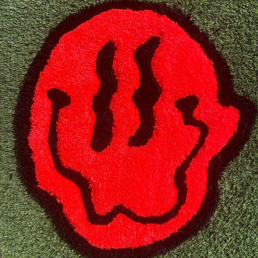 2 Ft smiley face rug